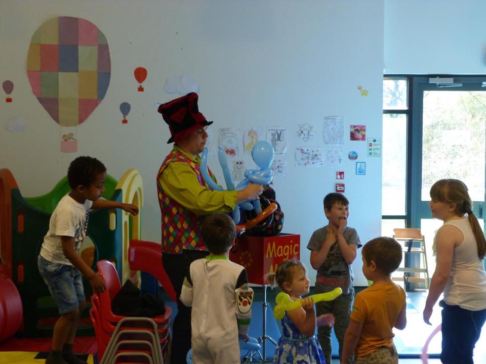 Magic Mike entertaining children at a party