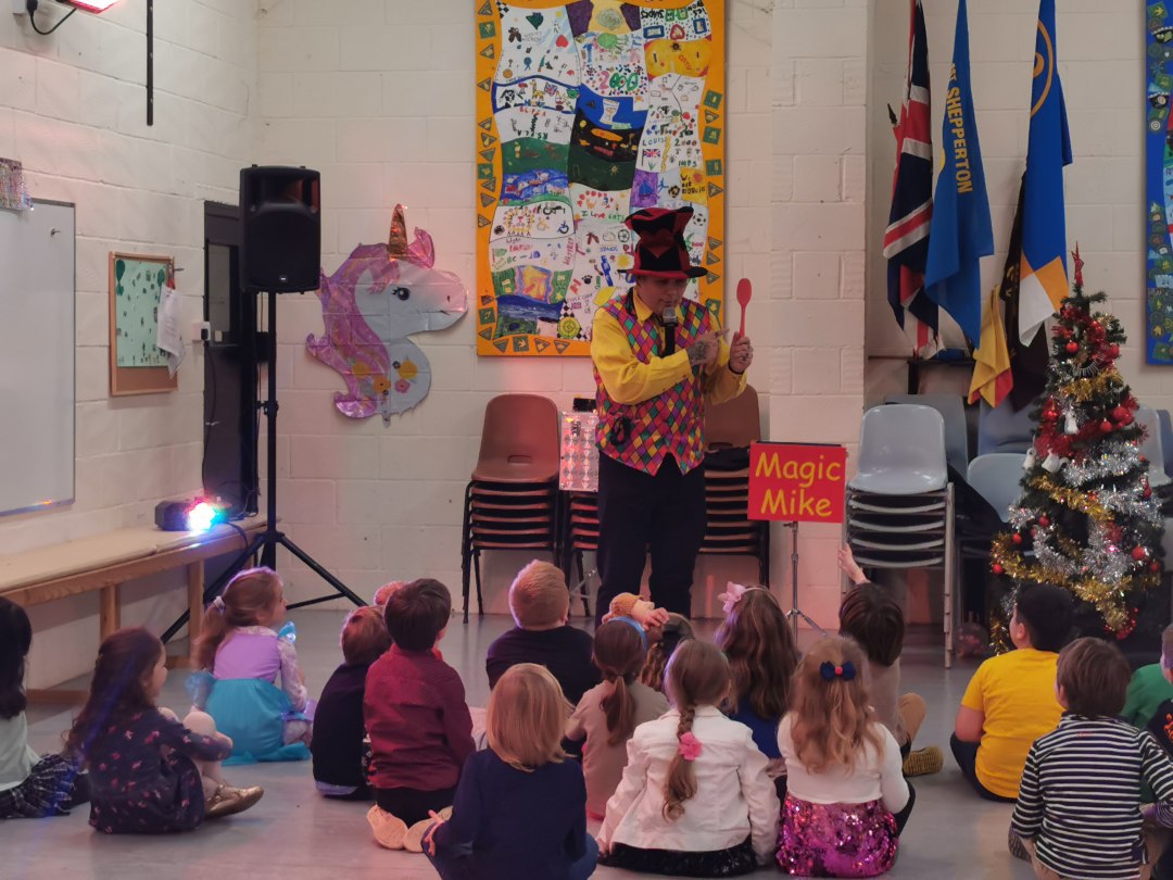 Magic Mike entertaining children at a party